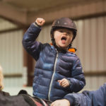 child on a horse