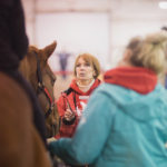 two women and a horse