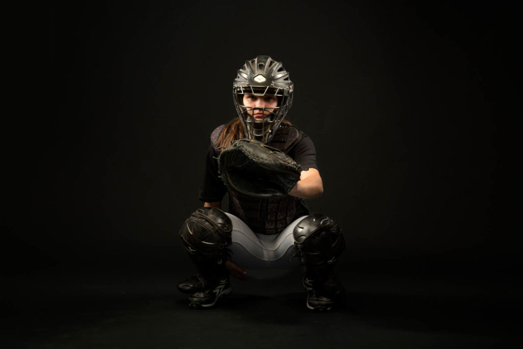 young woman softball catcher
