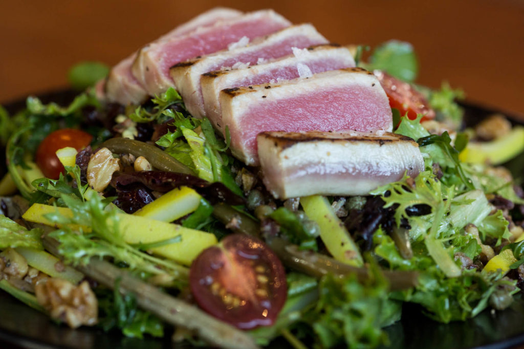 rare tuna on bed of greens