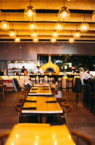 restaurant with wood pizza oven
