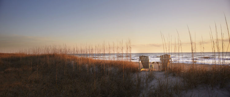 Beach with two chairs