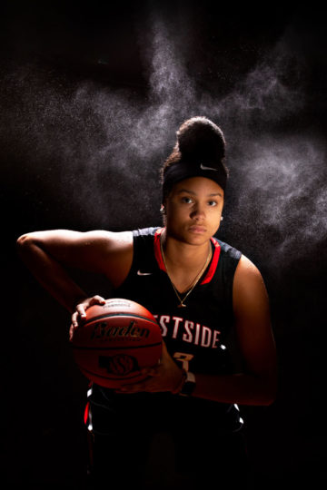 Young female adult basketball player