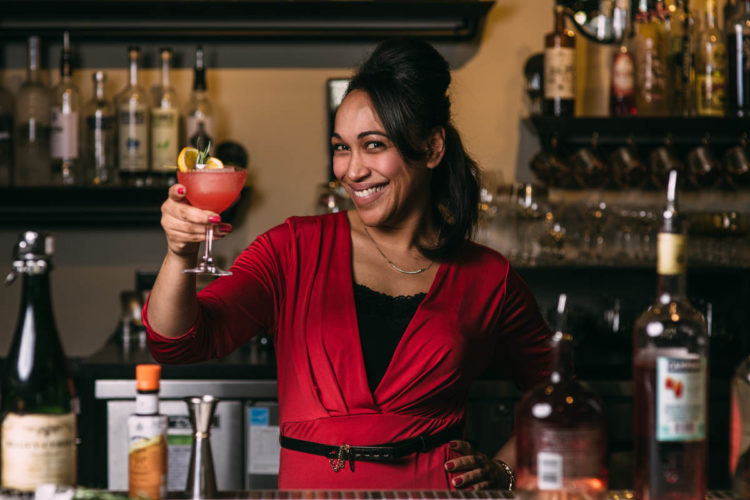 woman bartender with cocktail