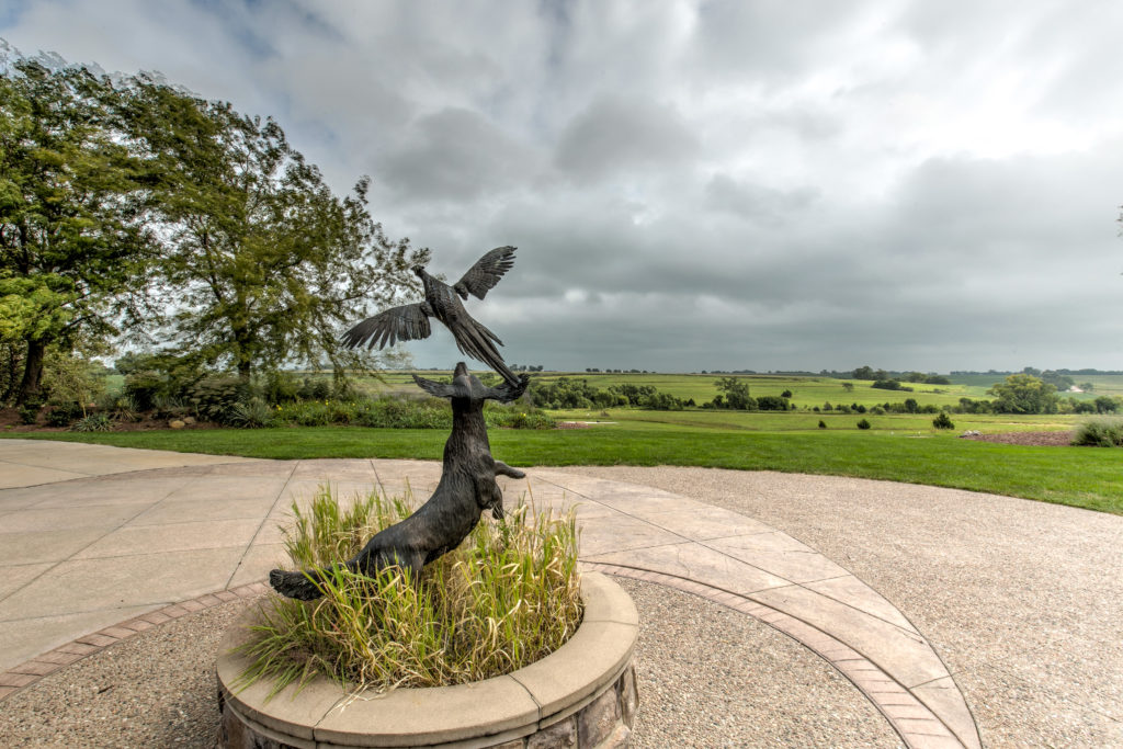 dog and pheasant statue
