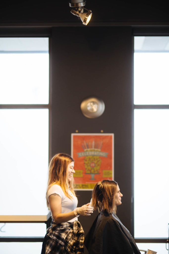 lady getting her hair cut