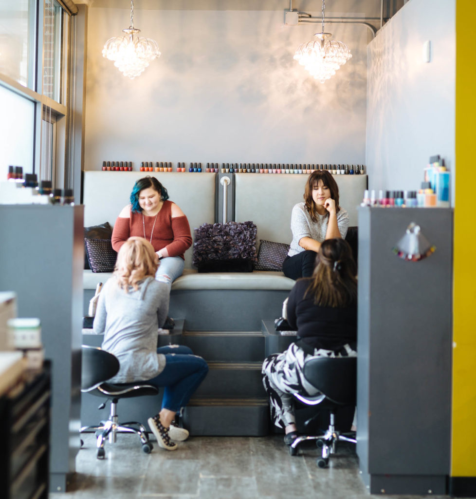 women getting their nails done