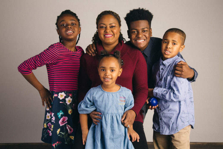 woman with four children