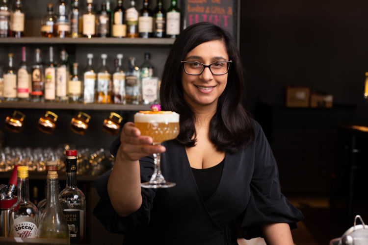 woman bartender with cocktail