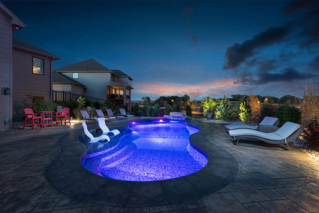 home outdoor pool at night