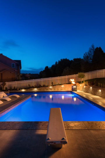home outdoor pool at night