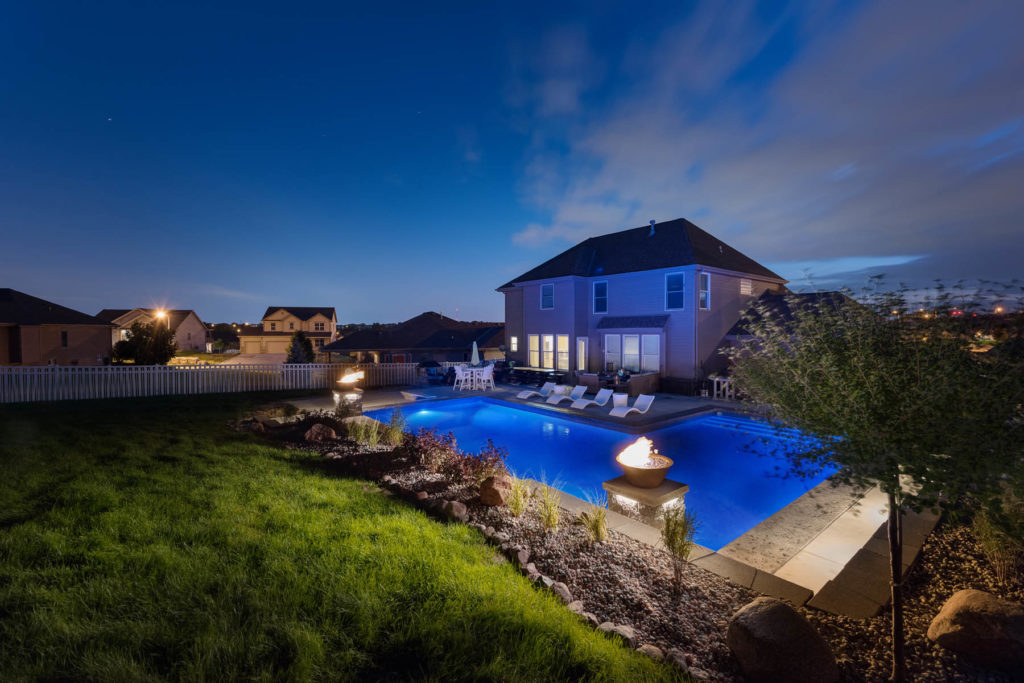 home outdoor pool at night