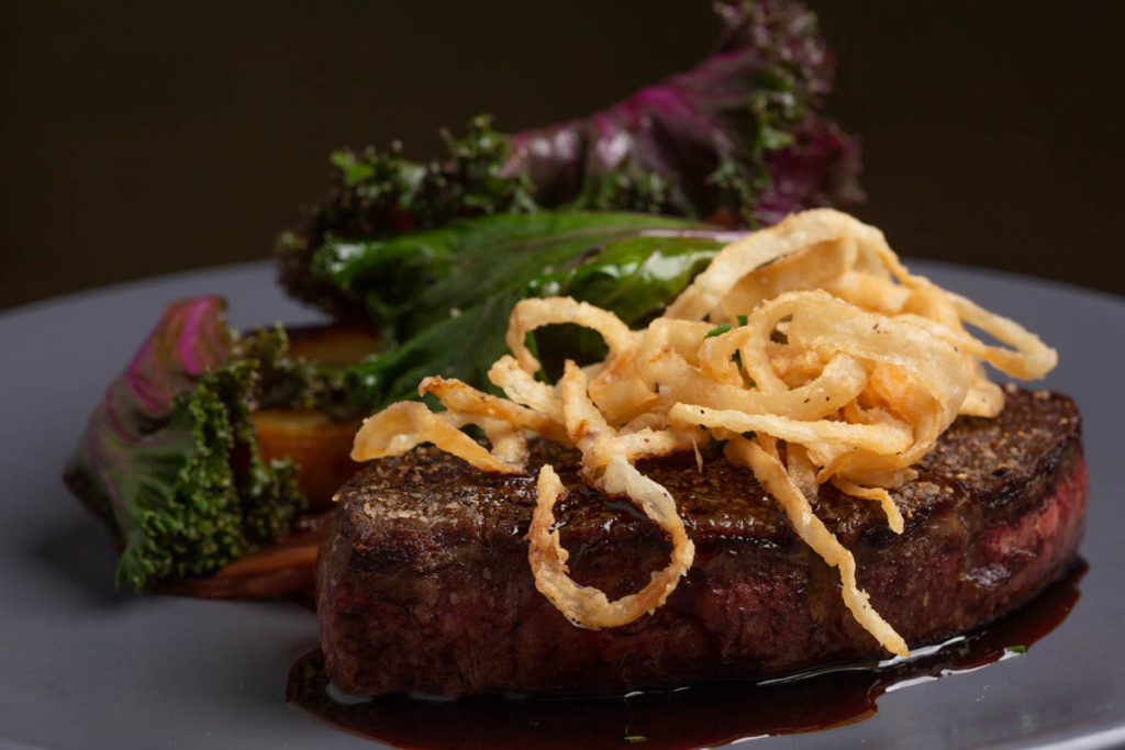steak with crispy onions