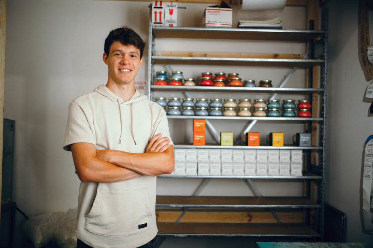 young man with candles