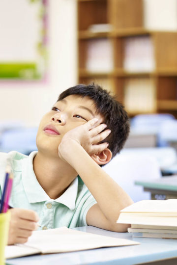 boy at school desk