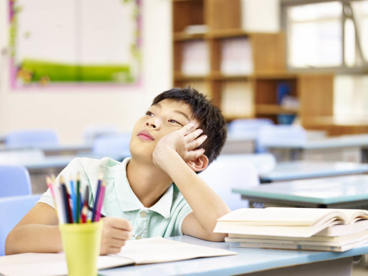 boy at school desk