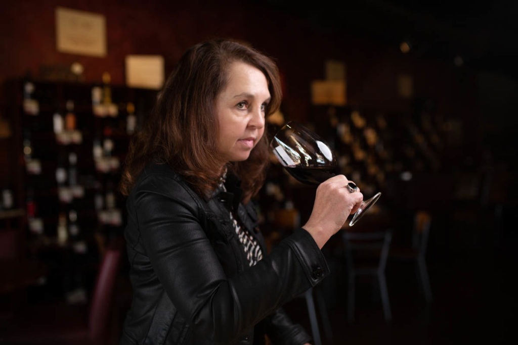 woman with glass of wine