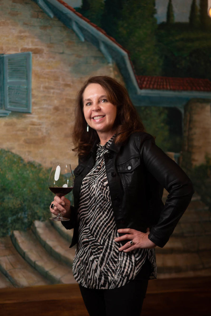 woman with glass of wine