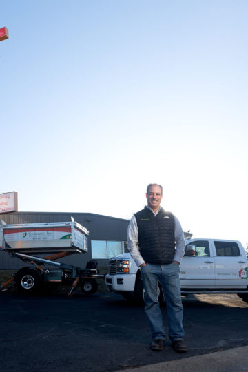 Man in front of truck