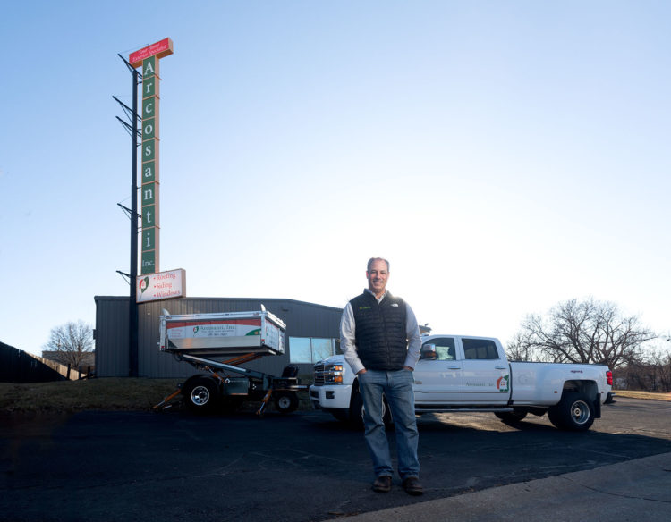 Man in front of truck