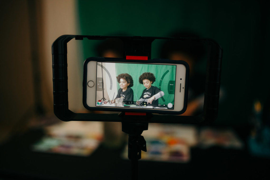 children on phone screen