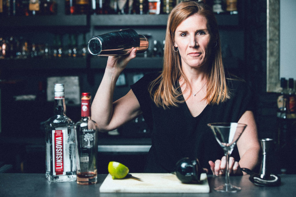 woman with cocktail shaker