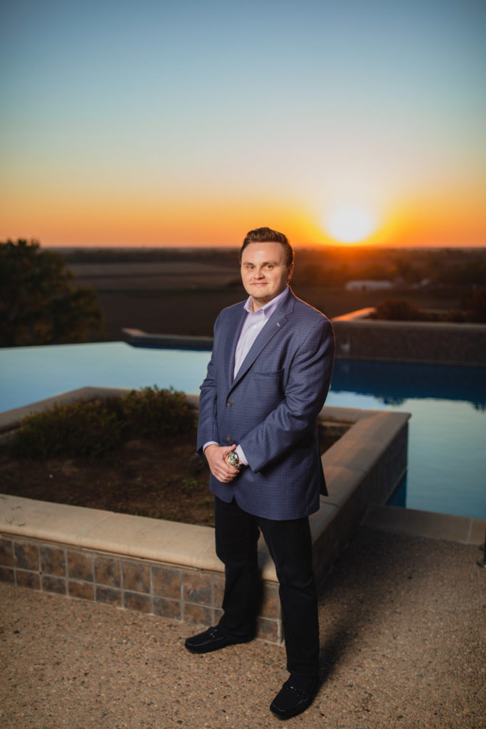 man in suit at sunset
