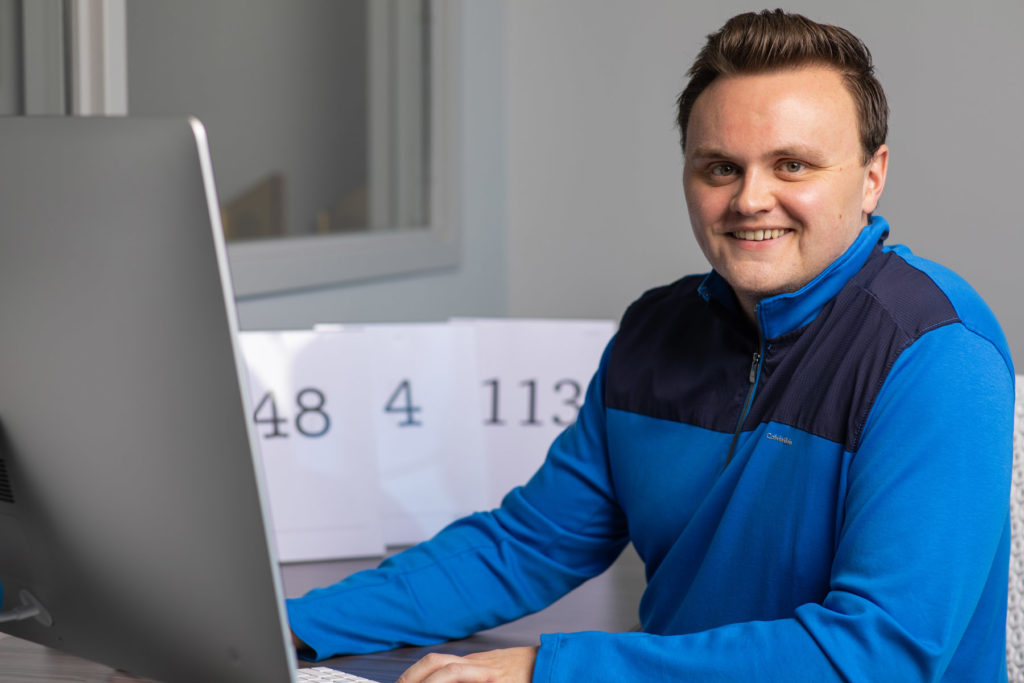 Man sitting in front of computer