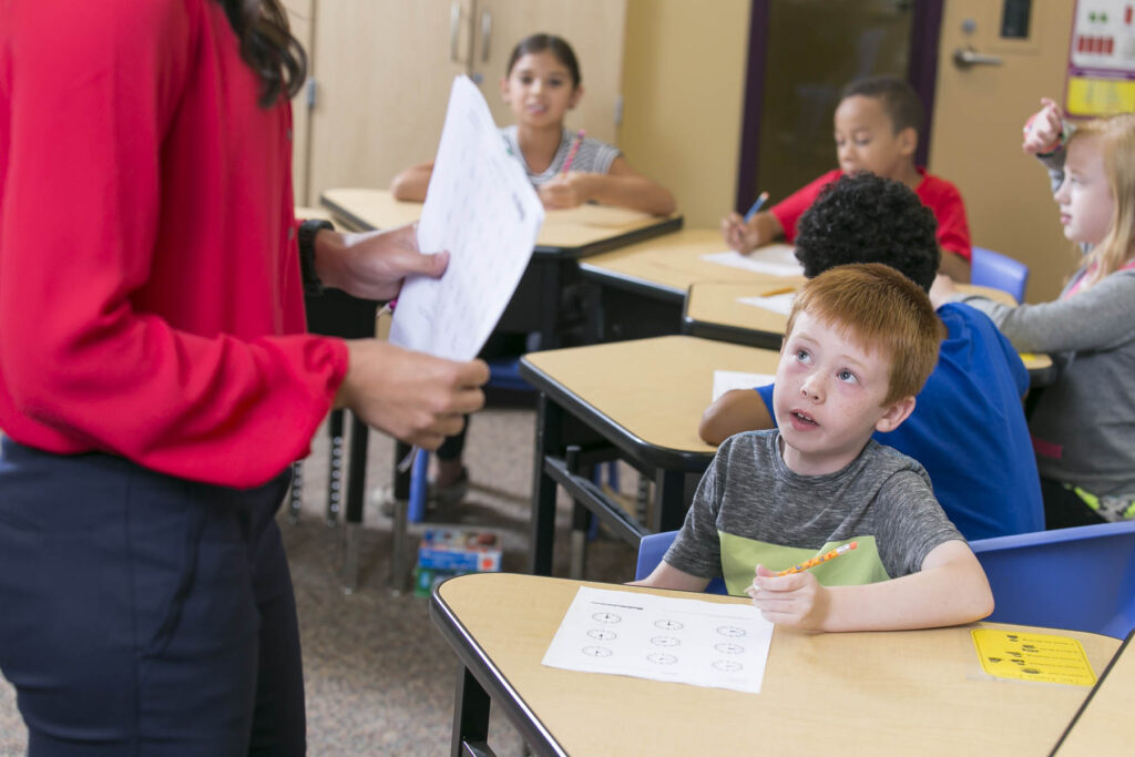boy in school at a desk