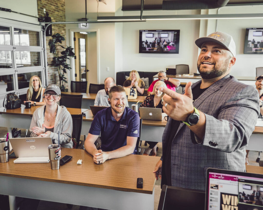 man instructing employees