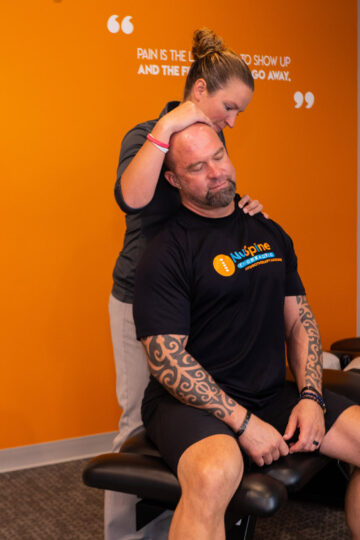 doctor stretching patient