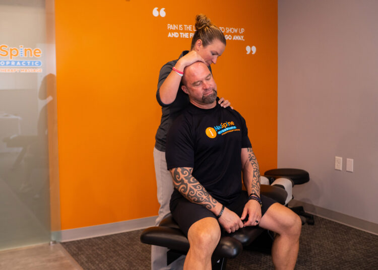 doctor stretching patient