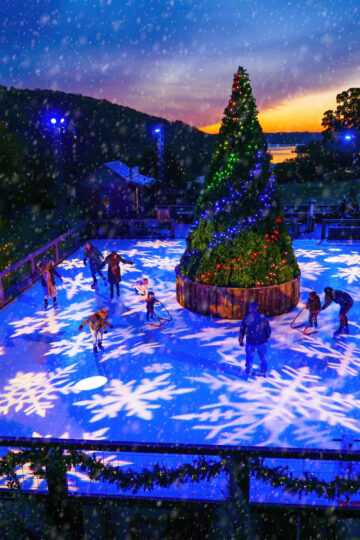 ice skating around a Christmas tree