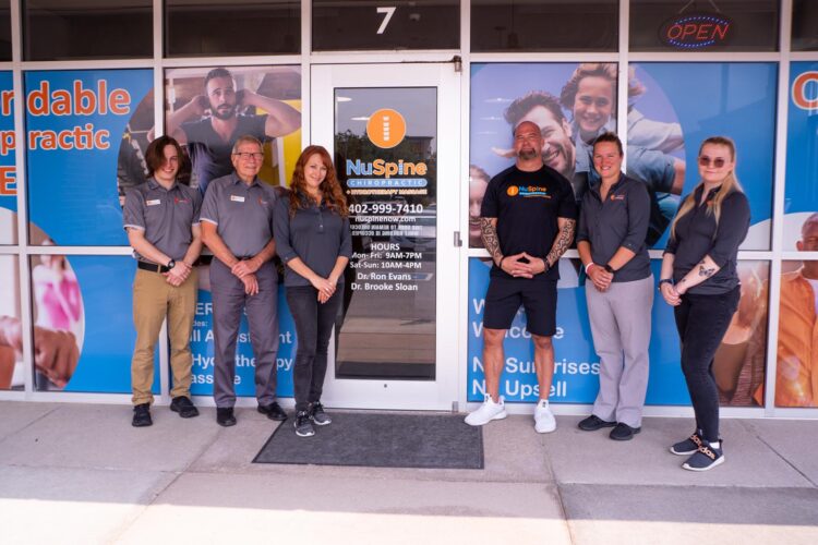 team outside of building