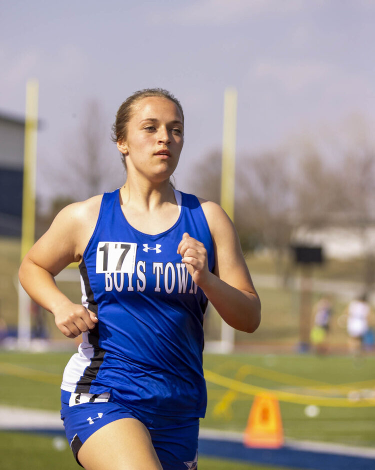 girl running track