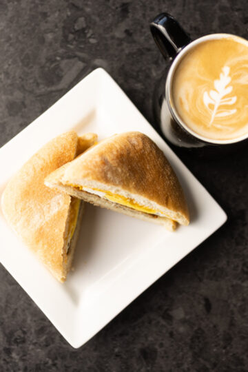 coffee and breakfast sandwich