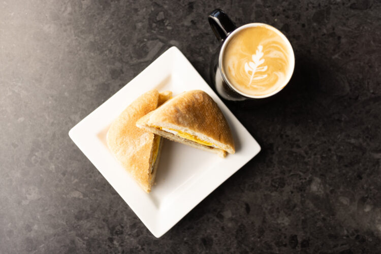 coffee and breakfast sandwich