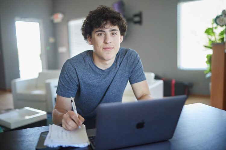 young man working on a computer