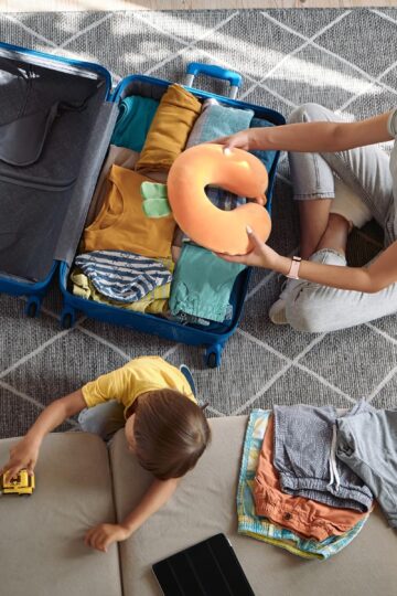 woman packing a suitcase